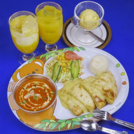 Set of chicken curry, rice, cheese naan, salad, and juice