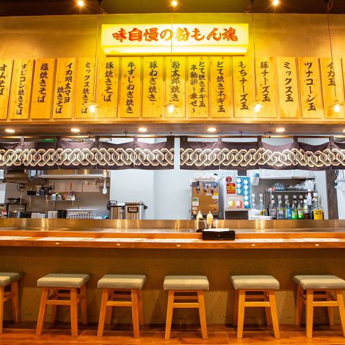 Enjoy authentic okonomiyaki and teppanyaki dishes in a casual setting in Namba!