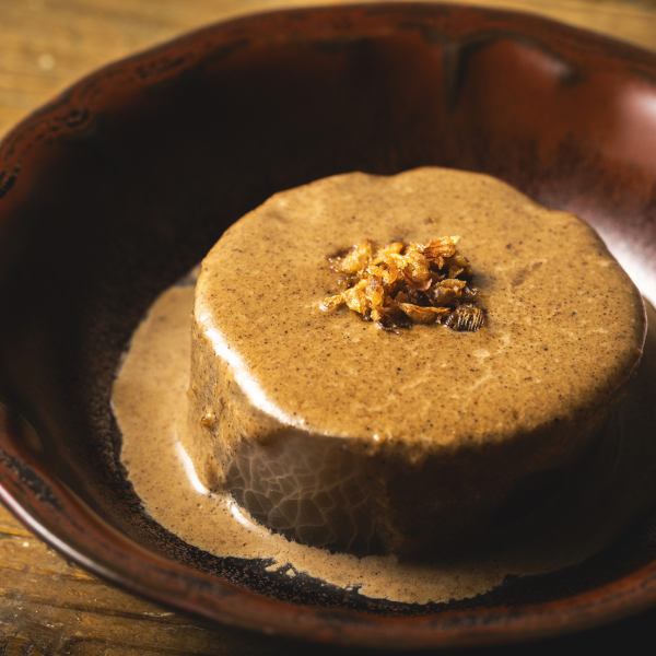Daikon radish with porcini sauce