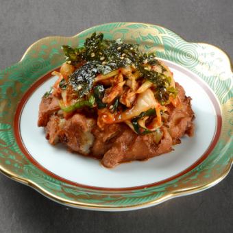 Deep-fried fish cake topped with Chinese cabbage kimchi