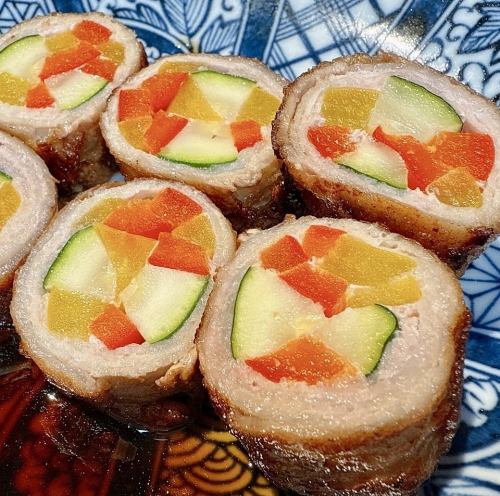 Paprika and zucchini wrapped in meat