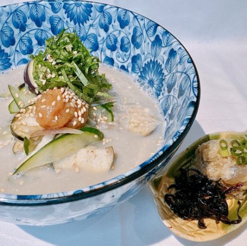 A refreshing cold soup to finish off the meal, with flying fish sauce