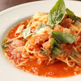 Stringy mozzarella and basil in homemade tomato sauce