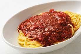 Heaped cheese meat sauce