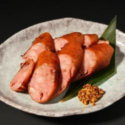 Charcoal-grilled meat sausages