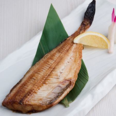 Half-grilled striped mackerel