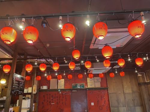 Red lanterns make the store feel like a festival