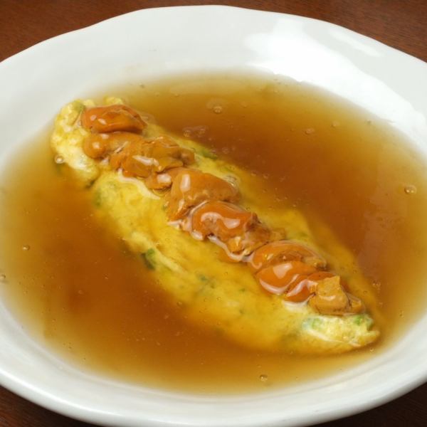 Japanese-style omelet with raw sea urchin soup stock