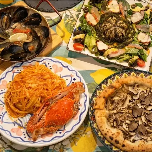 An exquisite seafood menu featuring fresh mussels and rare sea urchin.