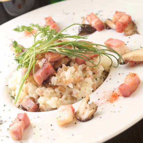 Charcoal-grilled risotto with porcini mushrooms and ancient rice