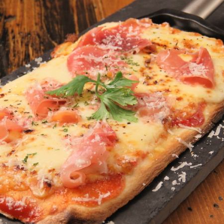 Margherita pizza with prosciutto and mozzarella
