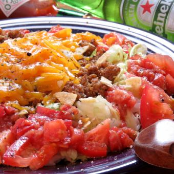 炙りチェダーチーズタコライス(炙チェタコラ)とろける旨みがやみつきになる