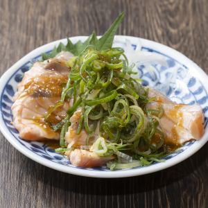 Salmon covered in green onions