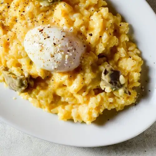 Creamy risotto with chicken gizzard confit and soft-boiled egg | Rich and creamy