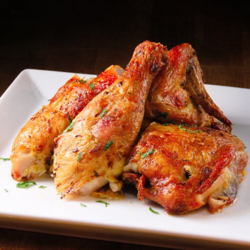 Very popular! Rotisserie chicken marinated for several days with secret spices