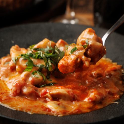 大山鶏のトマトチーズ焼き