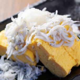 Rolled omelet with boiled whitebait