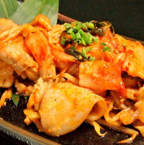 つぶ貝にんにくバター焼/豚キムチ炒め
