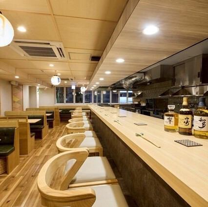 A sophisticated, modern Japanese space for adults, filled with the sounds and aromas of cooking