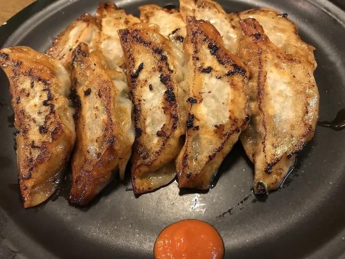 Grilled dumplings with dog barking pork