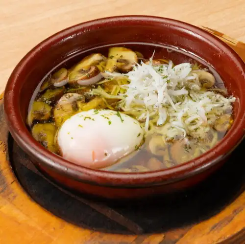 Ajillo with soft-boiled egg and whitebait