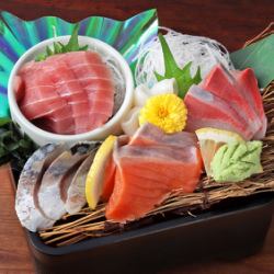 Five pieces of raw fish sashimi