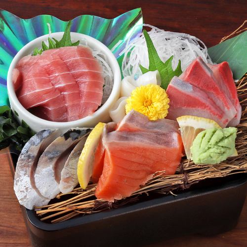 Five pieces of raw fish sashimi