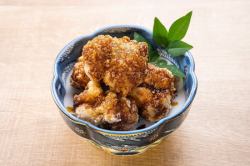 Deep fried chicken topped with premium Japanese pepper