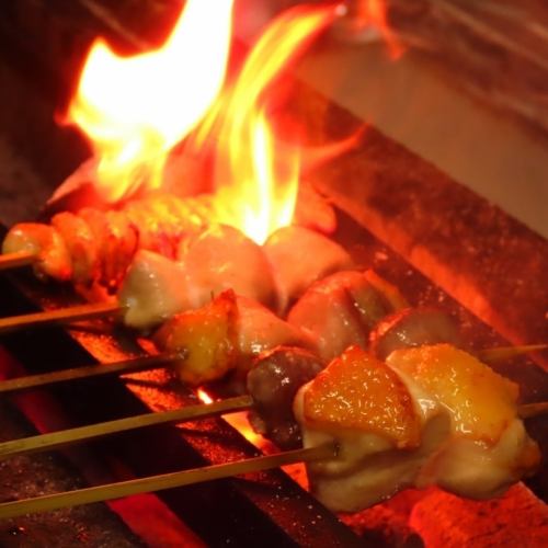 The aroma of charcoal-grilled Akagyu beef, yakitori, and seasonal fish
