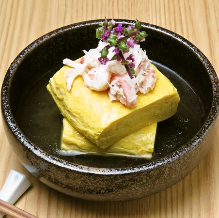 Crab meat soup-wrapped egg with shark fin bean paste