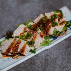 Drooling chicken covered in green onions