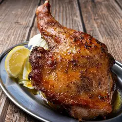 Grilled chicken thigh with bone