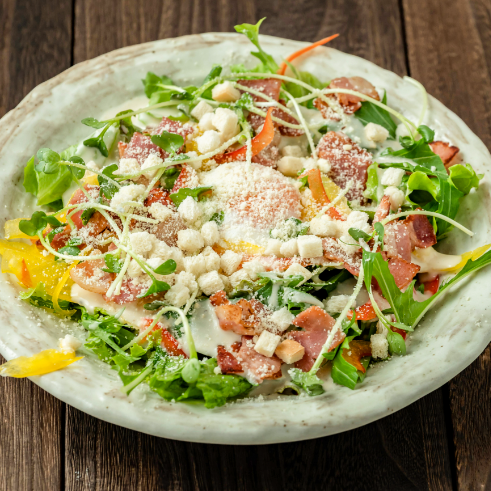 Caesar salad with grilled thick-sliced bacon and soft-boiled egg