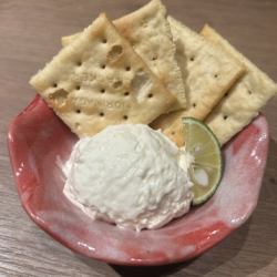 Homemade cream cheese, citrus fruit and honey