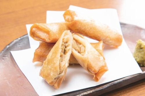 Black pork spring rolls