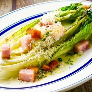 Whole oven-roasted romaine lettuce Caesar salad