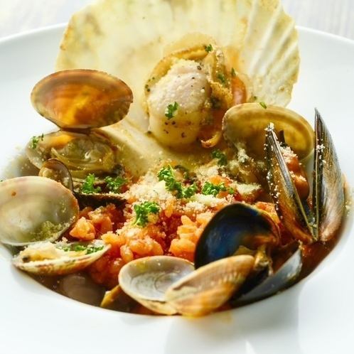 Tomato risotto with lots of clams and mussels