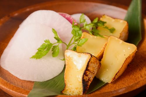 Camembert cheese pickled in miso with root vegetables