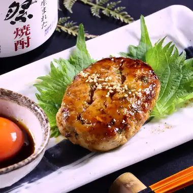 謹製つくね 旨だれ蘭王たまご。コースの一品でお愉しみいただけます。