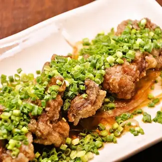 Whey-fed pork with green onions