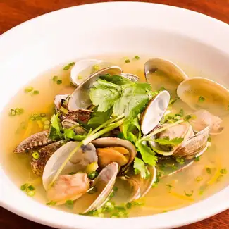 Clams steamed with "Dassai" sake