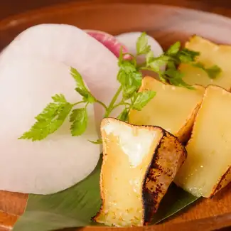 Camembert cheese marinated in miso, served with root vegetables.