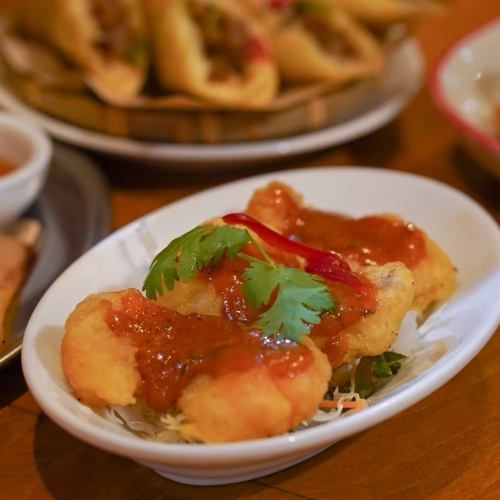 Chu Chi Pla (fried fish in coconut curry sauce)