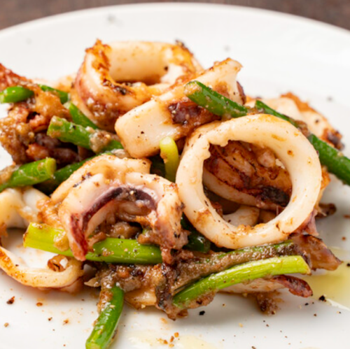Sauteed squid and garlic sprouts with anchovies