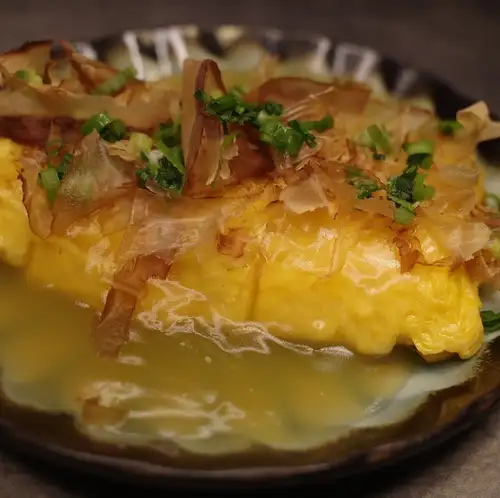 Tamagoyaki (rolled omelet) with thick sauce