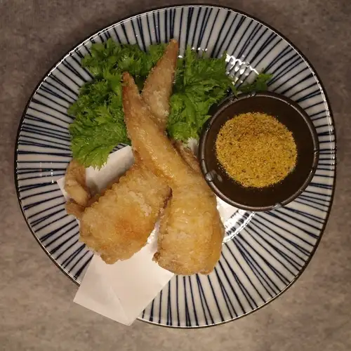 Ooyama chicken wings served with a secret blend of spices