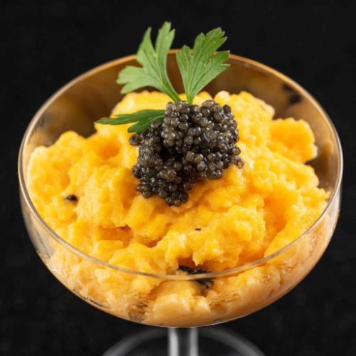 Luxury scrambled eggs with caviar and truffles