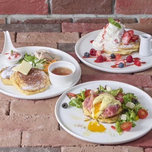 Various pancake plates (pancakes, berry mix pancakes, eggs Benedict)