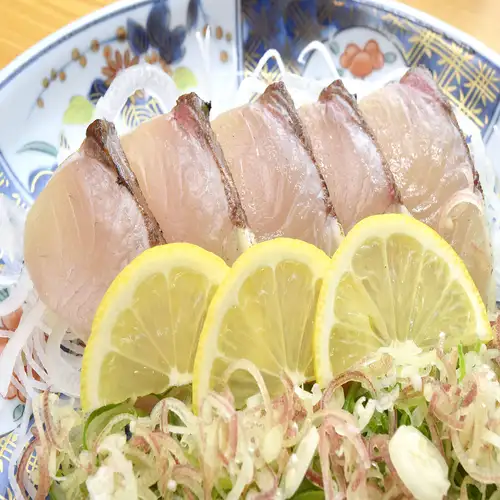 Yellowtail grilled over straw - served with salt and ponzu sauce.