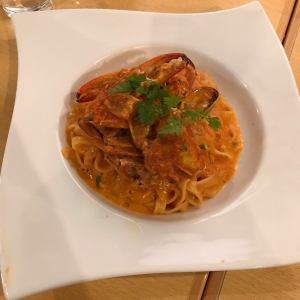 Migratory crab tomato cream fettuccine